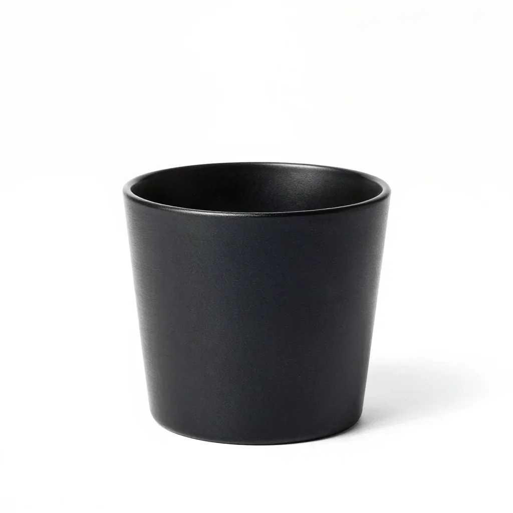 Matte black candle holder isolated on a white background