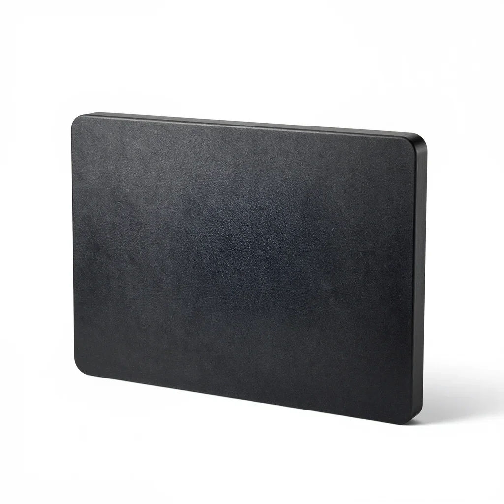 Matte black cutting board isolated on a white background