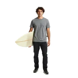 Surfer carrying a board