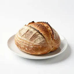 Sourdough boule with a scored crust