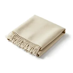 Folded wool throw with fringe