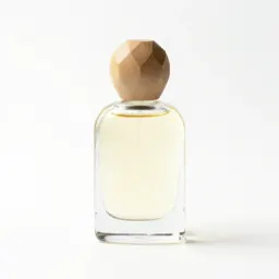 Perfume bottle with a faceted stopper