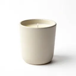 Scented candle in a vessel