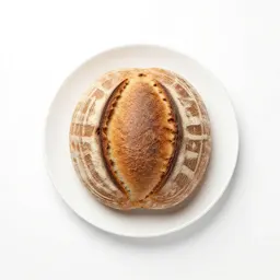 Sourdough boule with a scored crust