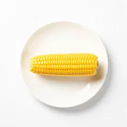 Corn cob with husk peeled