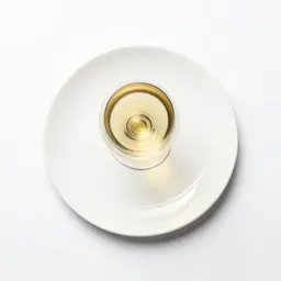 Glass of natural orange wine