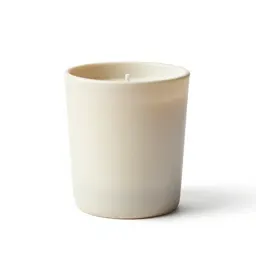 Scented candle in a vessel