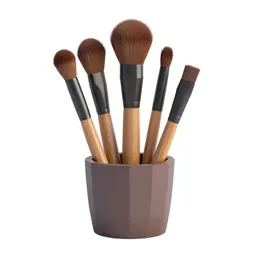 Makeup brush set in a cup