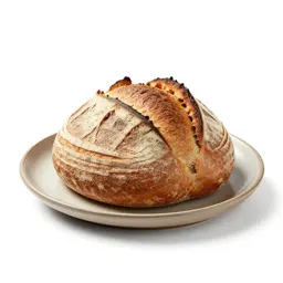 Sourdough boule with a scored crust