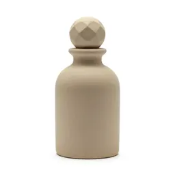 Perfume bottle with a faceted stopper