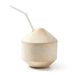 Fresh coconut with a straw