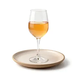 Glass of natural orange wine