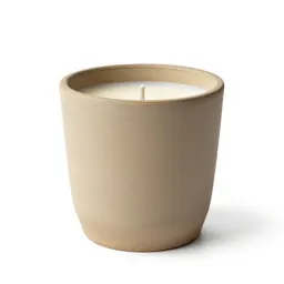 Scented candle in a vessel