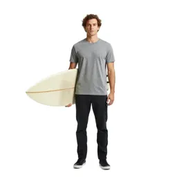 Surfer carrying a board
