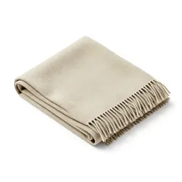 Folded wool throw with fringe