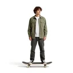 Skateboarder with a board underarm