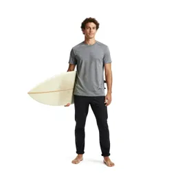 Surfer carrying a board