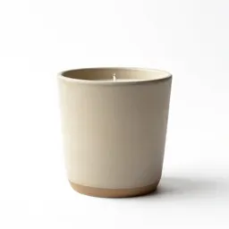 Scented candle in a vessel