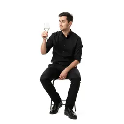 Sommelier examining a glass