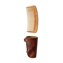 Comb in a leather sleeve