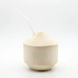 Fresh coconut with a straw