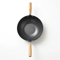 Wok with a wooden handle