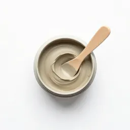 Clay mask jar with a spatula