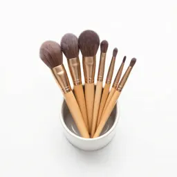 Makeup brush set in a cup