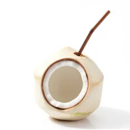 Fresh coconut with a straw