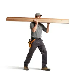Carpenter shouldering timber