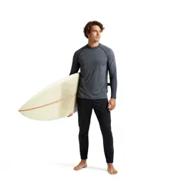 Surfer carrying a board