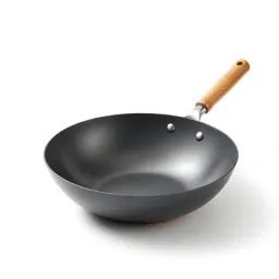 Wok with a wooden handle
