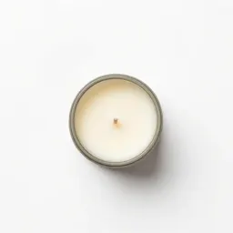 Scented candle in a vessel