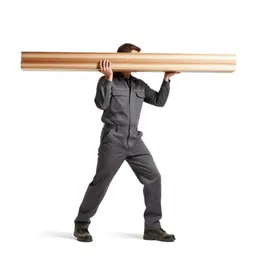 Carpenter shouldering timber