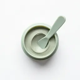 Clay mask jar with a spatula