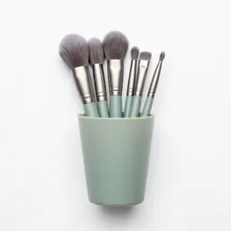 Makeup brush set in a cup