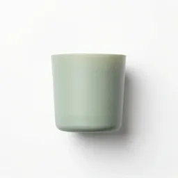Scented candle in a vessel