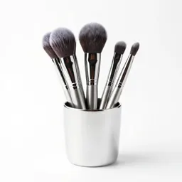 Makeup brush set in a cup