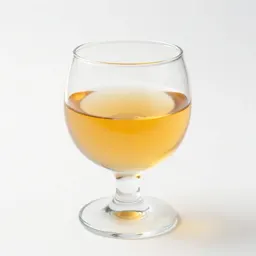 Glass of natural orange wine