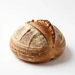Sourdough boule with a scored crust