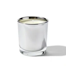 Scented candle in a vessel