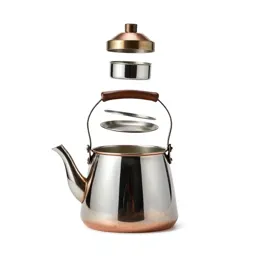 Copper kettle with patina