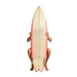 Surfer carrying a board