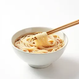 Bowl of noodles with chopsticks