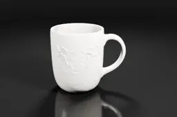 White ceramic mug with a handle on the right side