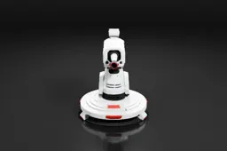 Robot-like object with a white body and red accents