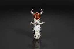 Photograph of a decorative object, which appears to be a dagger or a pendant