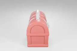 Small, pink-colored object with a curved top and a small opening at the bottom