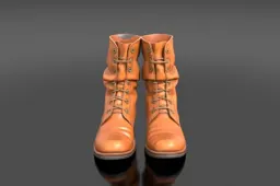 Pair of vintage tan leather ankle boots, cracked patina finish with brass
