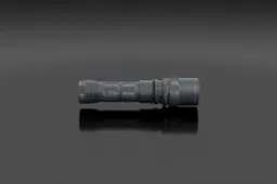 Rugged tactical flashlight in matte black anodized aluminum with a knurled